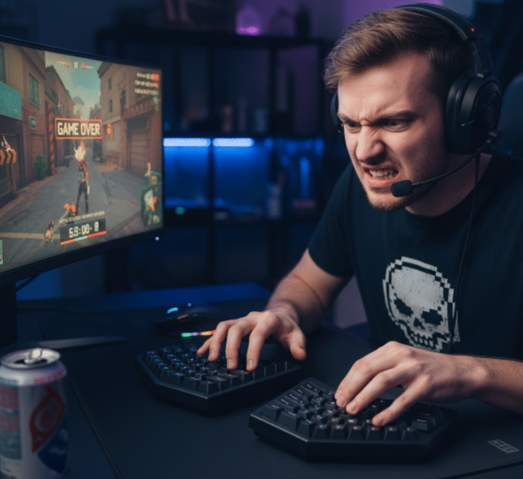 Gamer looking frustrated while adjusting to a new ergonomic keyboard - Dealibrium