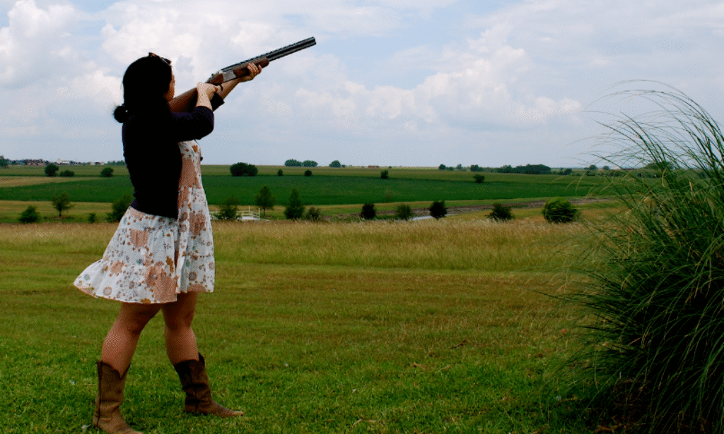 A duck hunter using a 20-gauge shotgun in a blind, showcasing its effectiveness for modern waterfowl hunting - Dealibrium